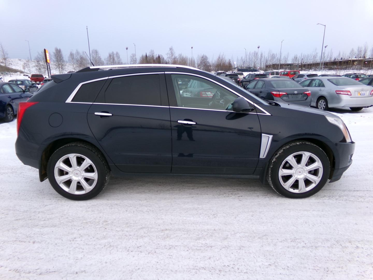 2014 Black Cadillac SRX Performance Collection FWD (3GYFNCE37ES) with an 3.6L V6 DOHC 24V FFV engine, 6-Speed Automatic transmission, located at 2630 Philips Field Rd., Fairbanks, AK, 99709, (907) 458-0593, 64.848068, -147.780609 - Photo#2